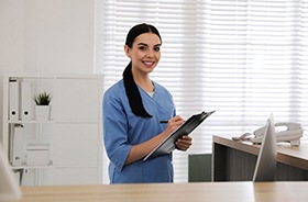 Dental team member, ready to discuss payment options for braces