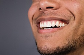 Close-up of man’s smile with healthy teeth and gums