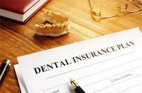 Dental insurance document on desk