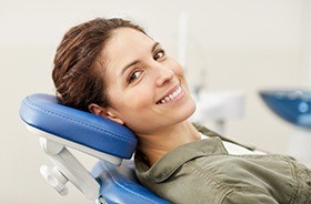 Smiling woman in dental chair