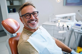 Middle-aged dental patient in treatment chair