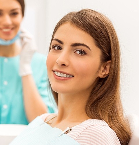 Smiling woman with braces